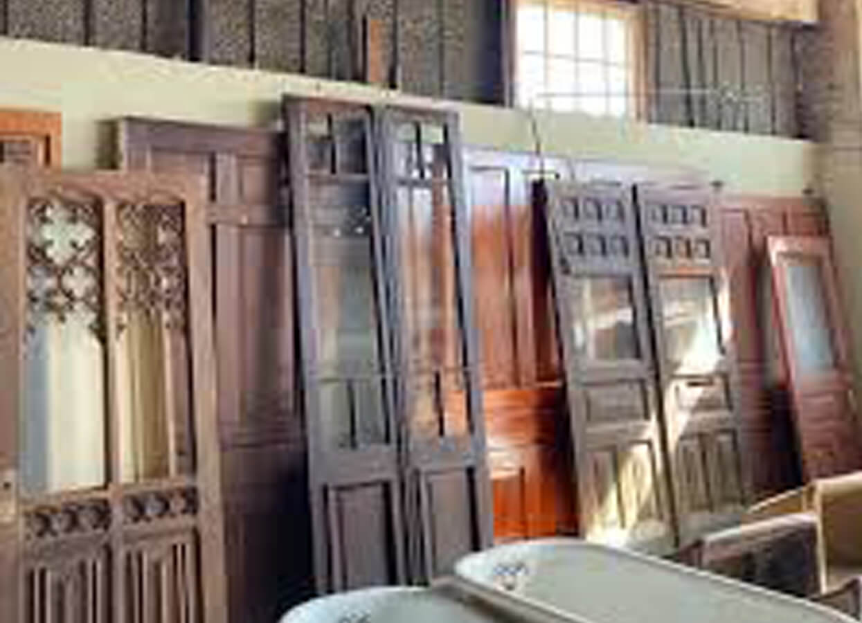 Showing antique doors at Discovery Architectural Antiques.