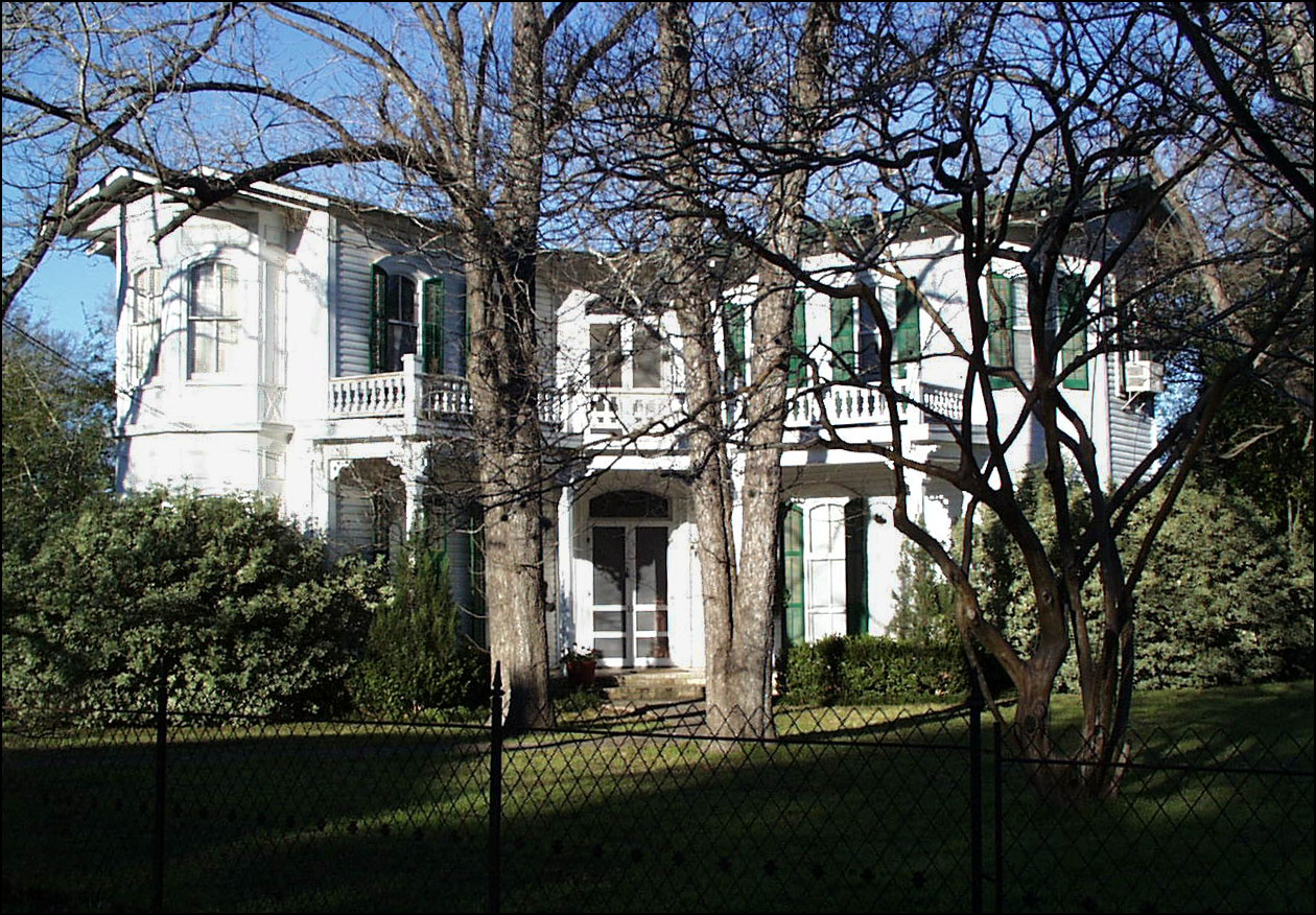 Dr. J.C. Jones came to Texas in 1855. He later studied in Scotland, London and Paris. When the Civil War started he returned and served the Confederacy as personal physician to General Hood. He came to Gonzales in 1865 and built this Italianate-style house in 1885. The house uses seven different woods in the floors, wainscoting and trim. The staircase is of Gonzales walnut.